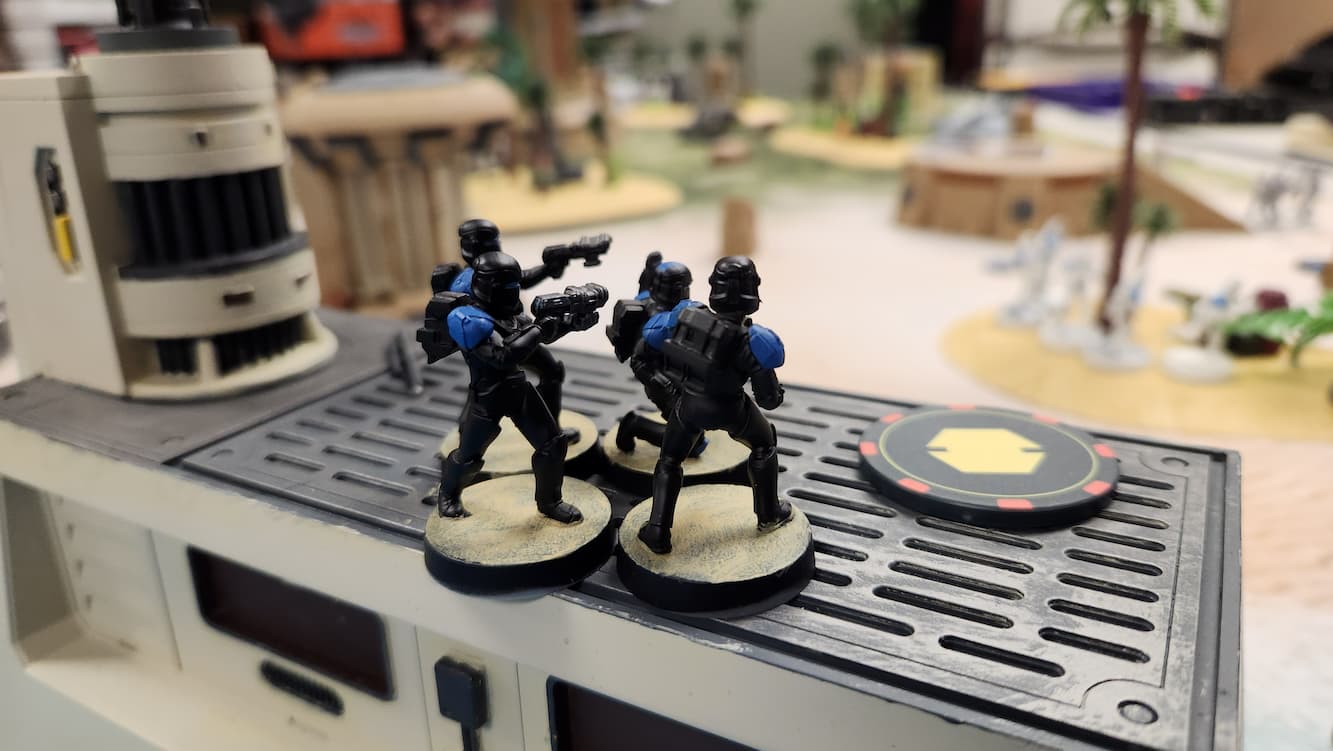 Blue Commandos fire on roof